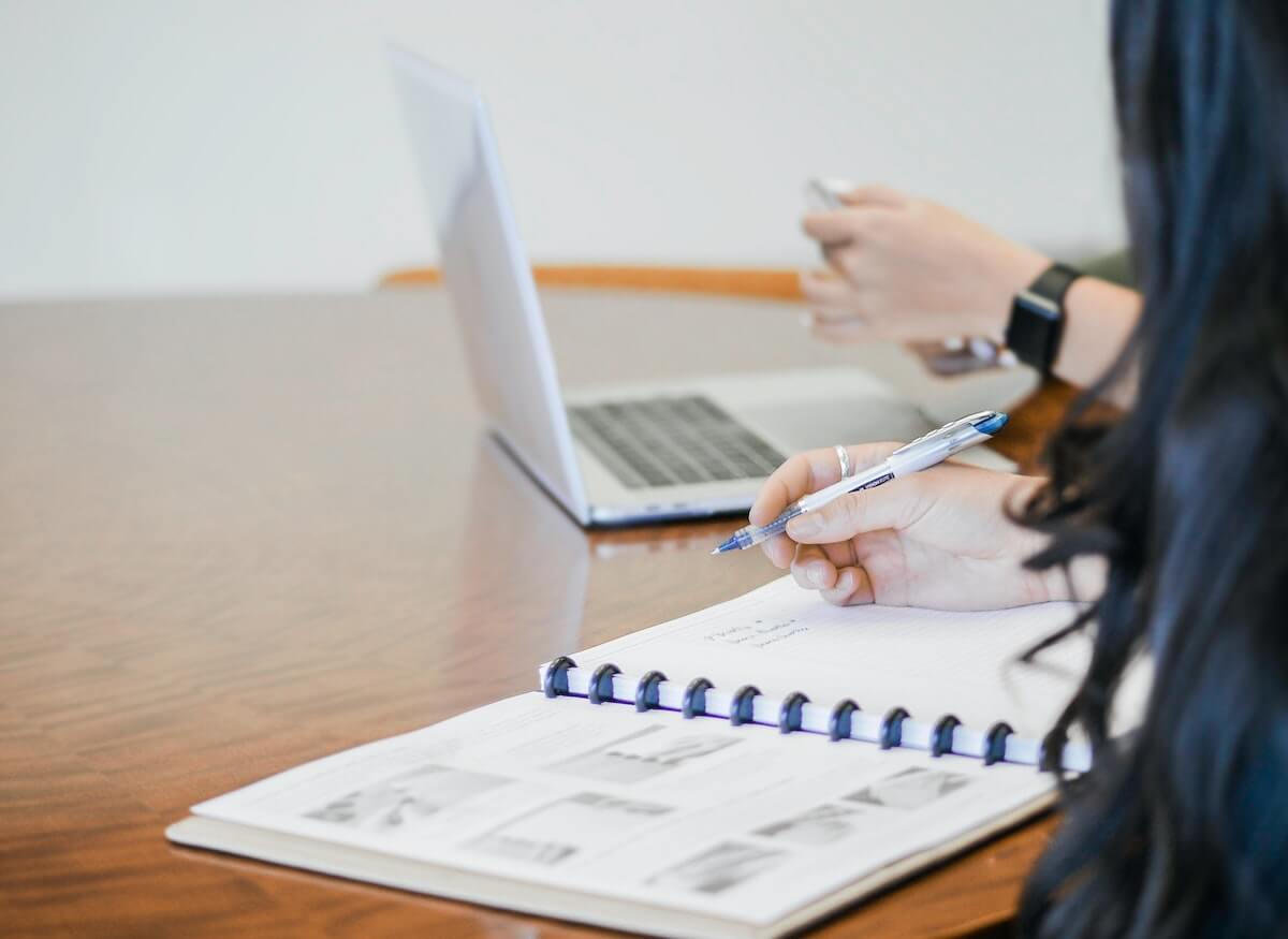 Man using accounting software on laptop